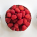 a row of 3 bowls of berries